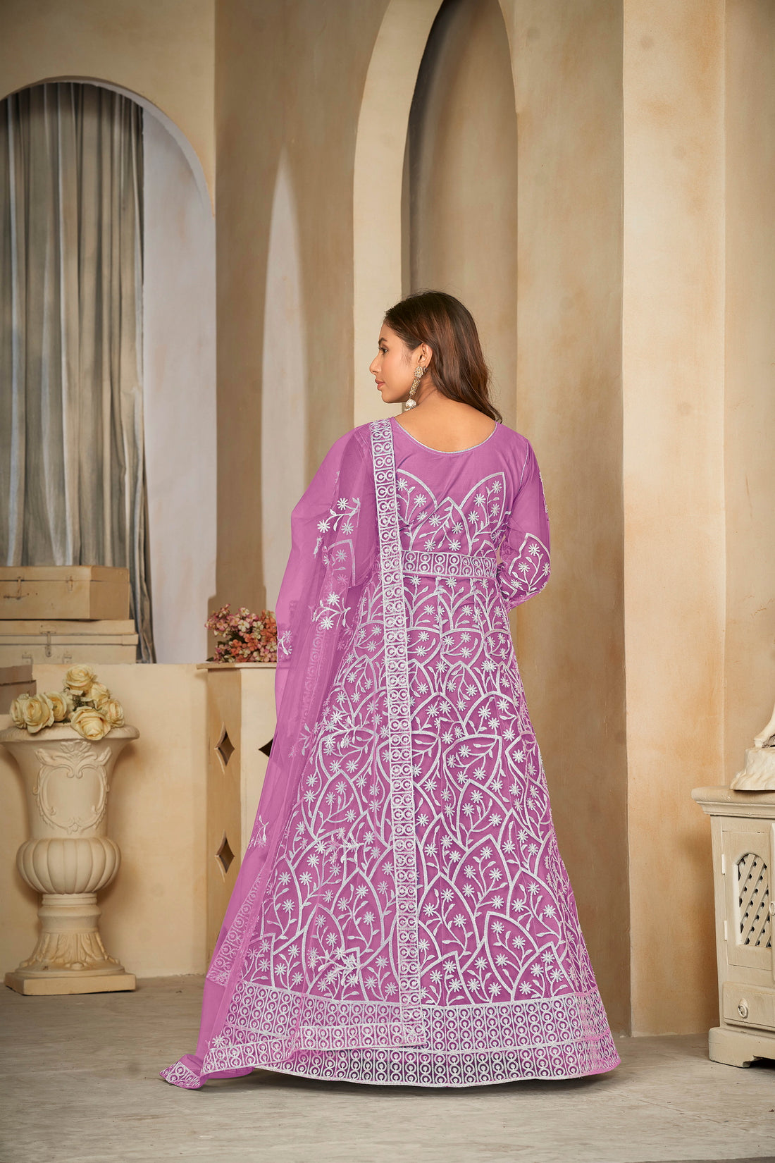Delicate Purple Net Anarkali Suit with Intricate All-Over Embroidery