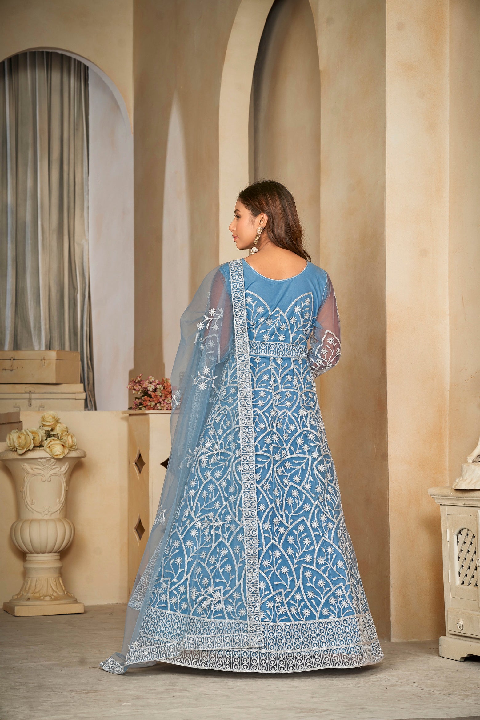 Delicate Sky Blue Net Anarkali Suit with Intricate All-Over Embroidery