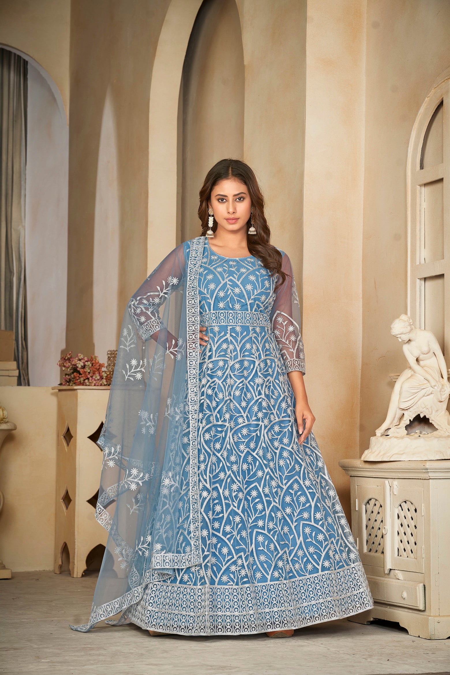 Delicate Sky Blue Net Anarkali Suit with Intricate All-Over Embroidery