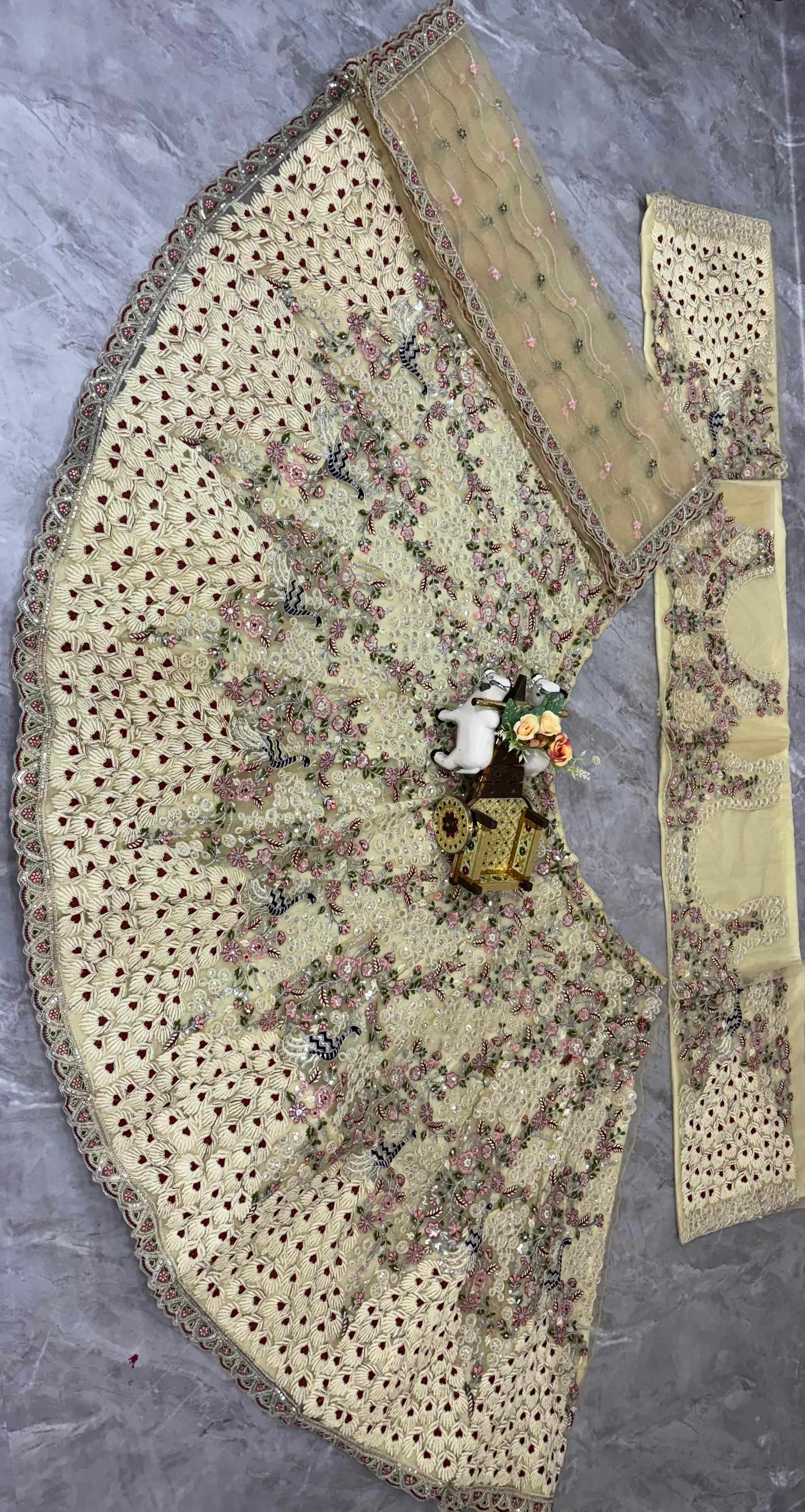 Cream Embroidered Net Lehenga Choli with Floral Detailing