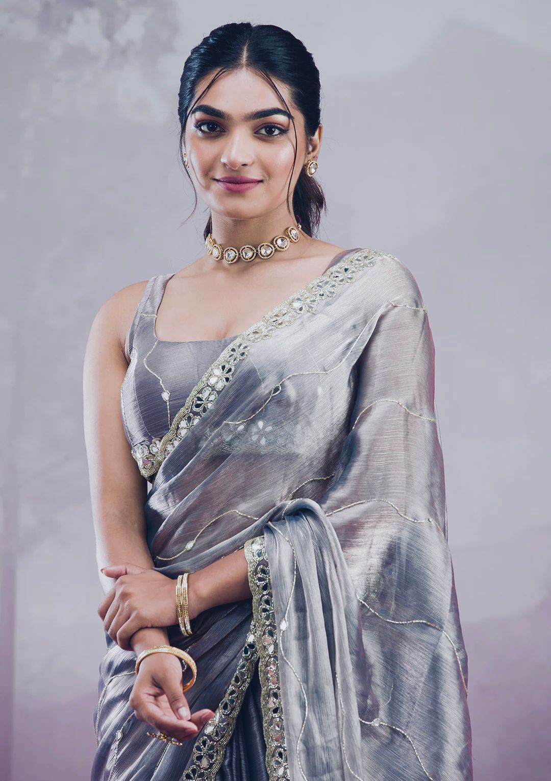 Silver Saree with Mirror Work Border and Embellished Blouse