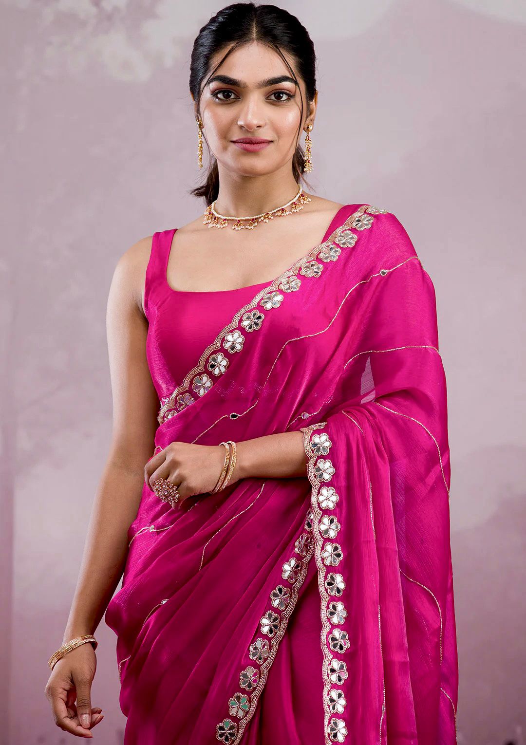 Pink Saree with Mirror Work Border and Embellished Blouse