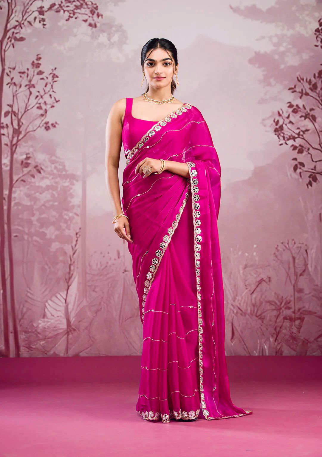 Pink Saree with Mirror Work Border and Embellished Blouse