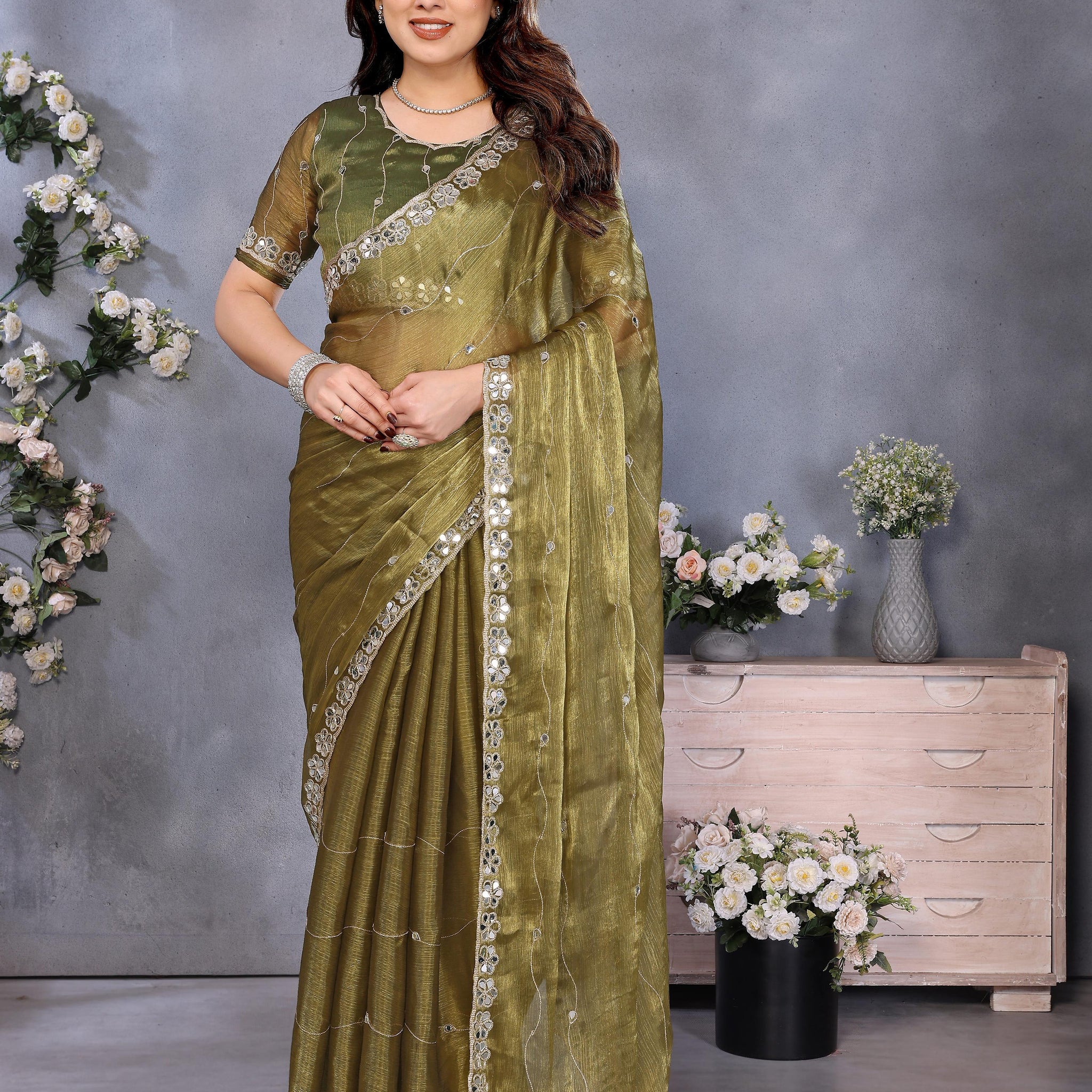 Green Saree with Mirror Work Border and Embellished Blouse