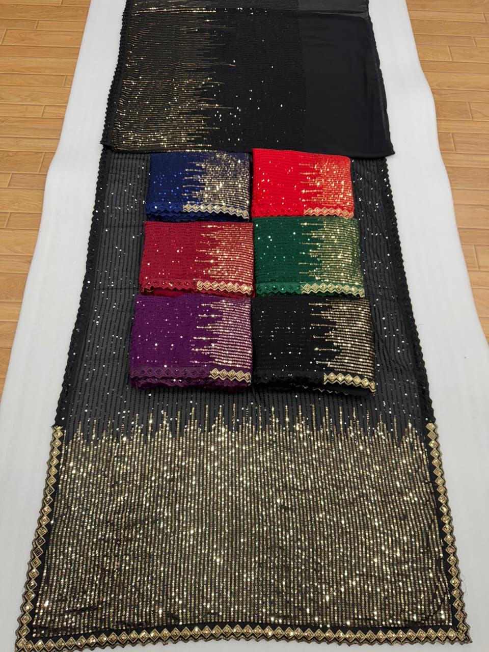 Blue Sequin Embellished Georgette Saree with Golden Ombre Border