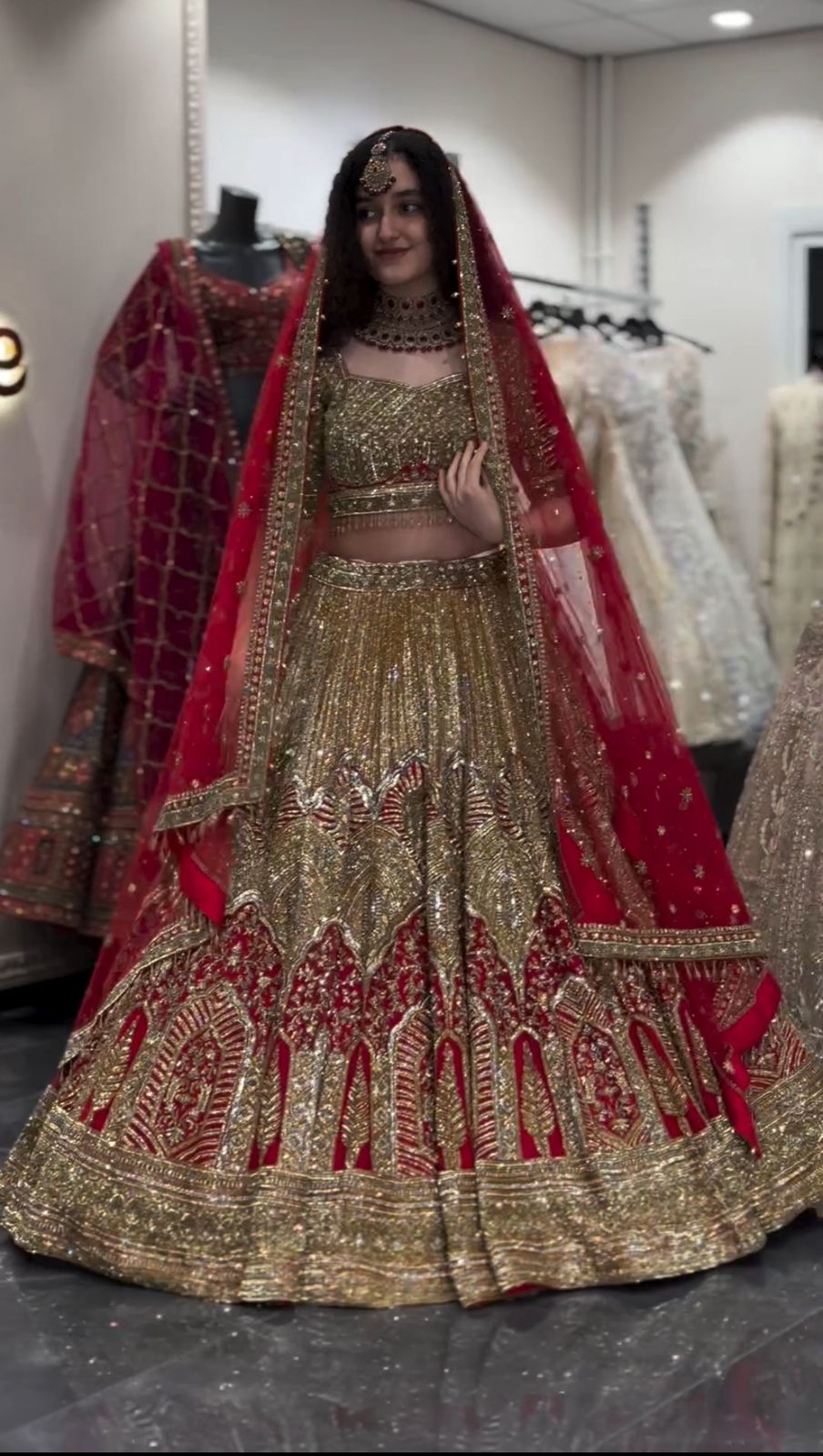 Red and Gold Heavy Embroidered Bridal Lehenga Choli with Net Dupatta