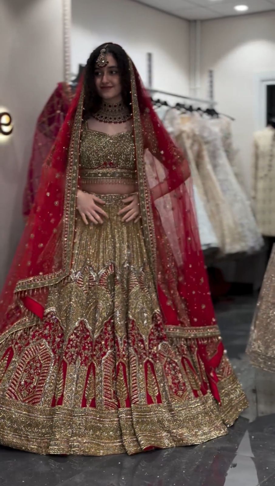 Red and Gold Heavy Embroidered Bridal Lehenga Choli with Net Dupatta