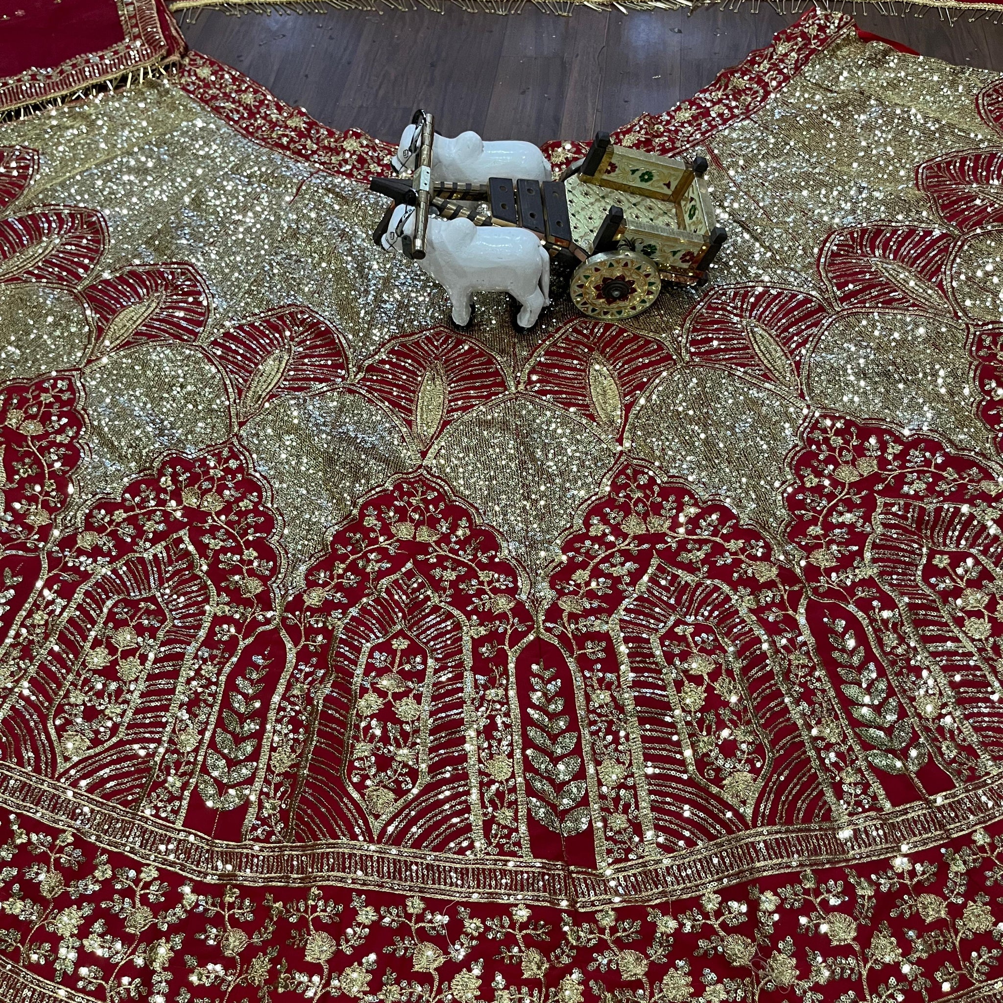 Red and Gold Heavy Embroidered Bridal Lehenga Choli with Net Dupatta