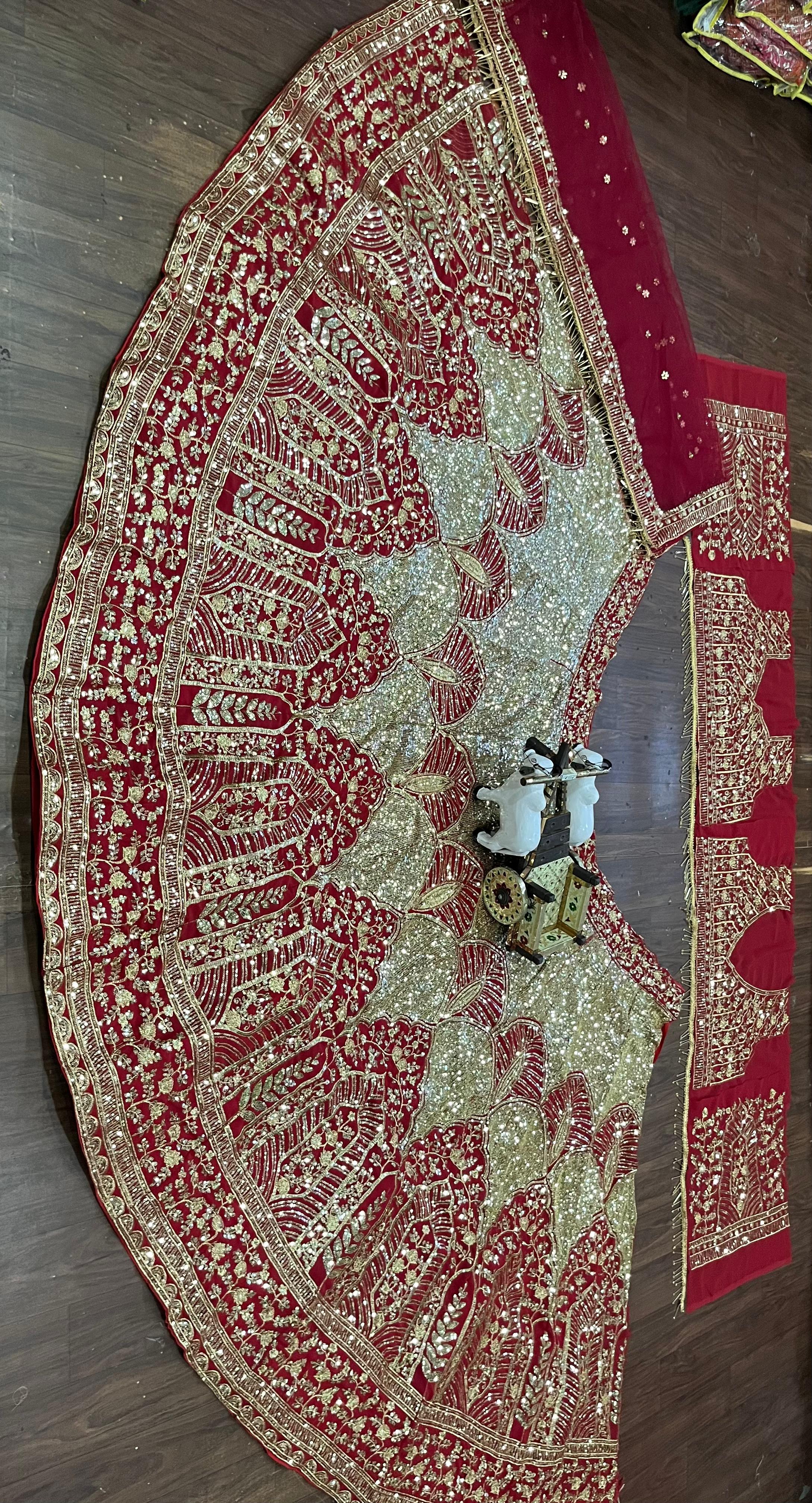 Red and Gold Heavy Embroidered Bridal Lehenga Choli with Net Dupatta